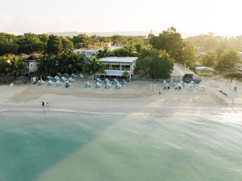 Aerial view of the beach cabanas, turquoise waters and powder white sand at Skylark Negril Beach Resort, Negril, Jamaica