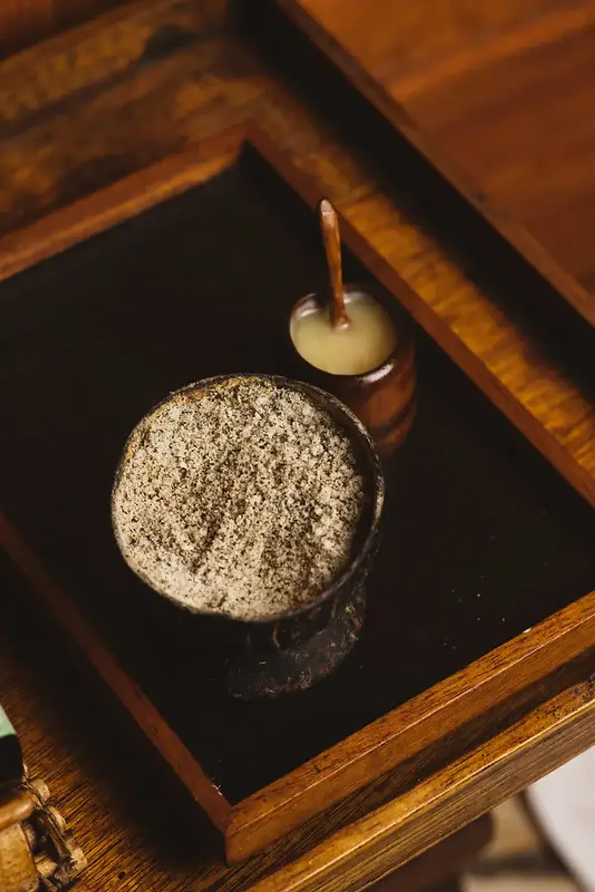 Bowls with natural spa ingredients, including a scrub and a liquid, at Rockhouse Hotel in Negril, Jamaica, highlighting the organic spa treatments at Rockhouse Hotel.