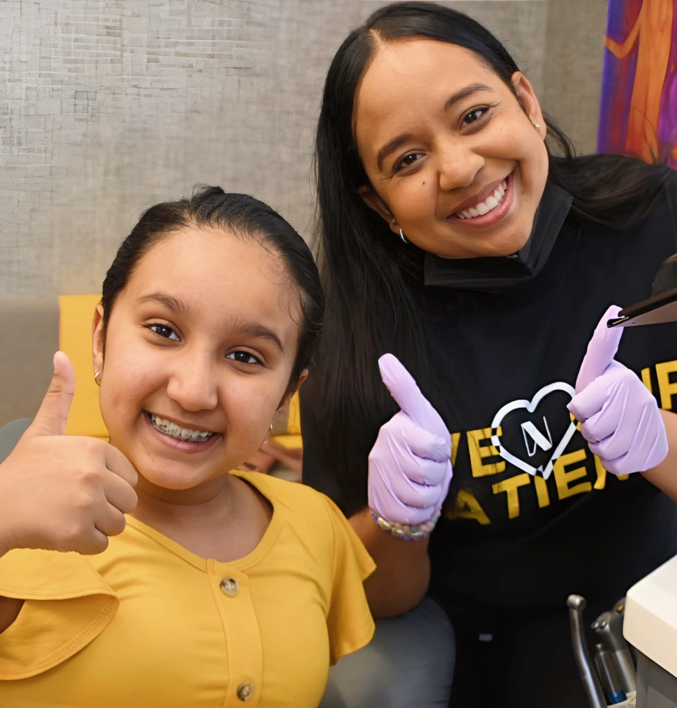 smiling patient and staff