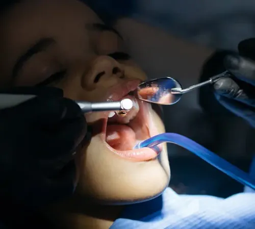 Child receiving a dental cleaning at East End Tooth Ferry pediatric dentist in Southampton, New York.