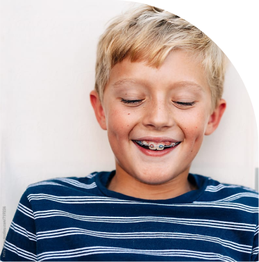 smiling kid with braces