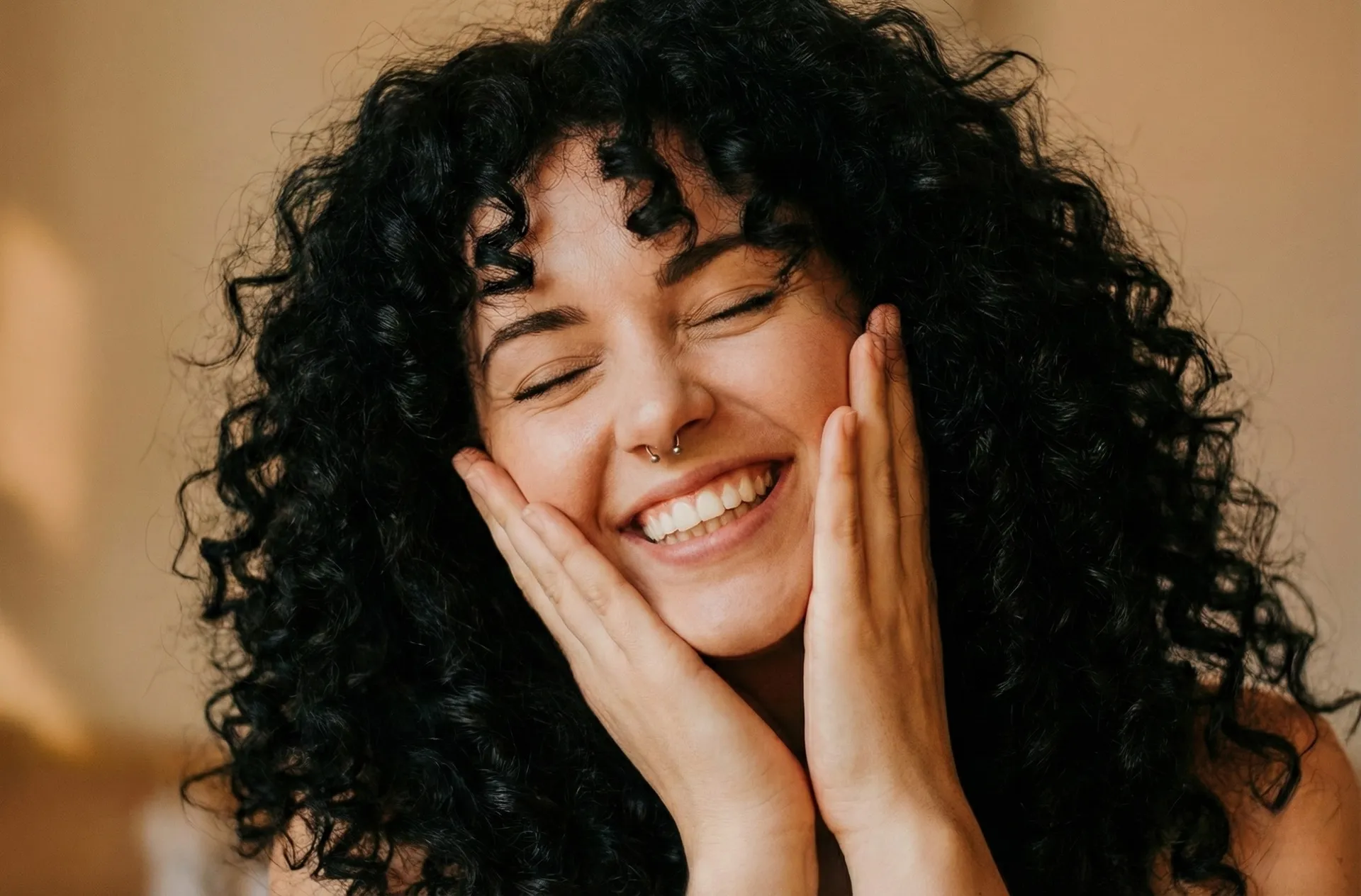 Smiling patient showing healthy white teeth after cosmetic dental treatment – LIV Dentistry