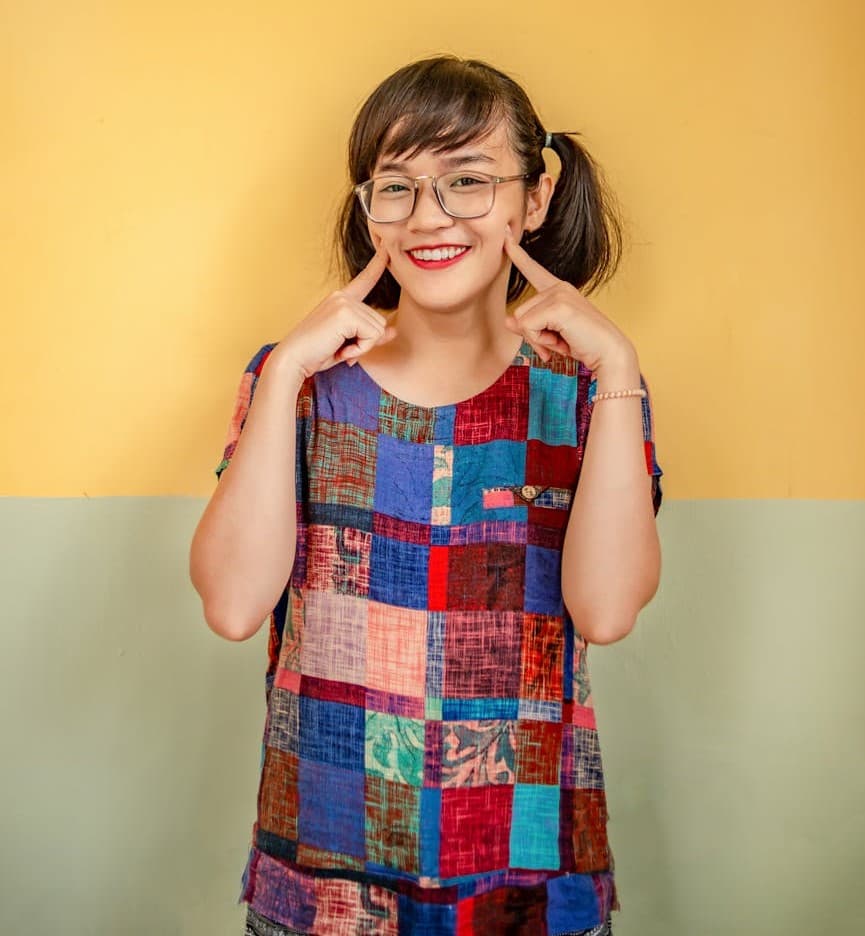 Young patient smiling confidently showing healthy straight teeth – LIV Dentistry