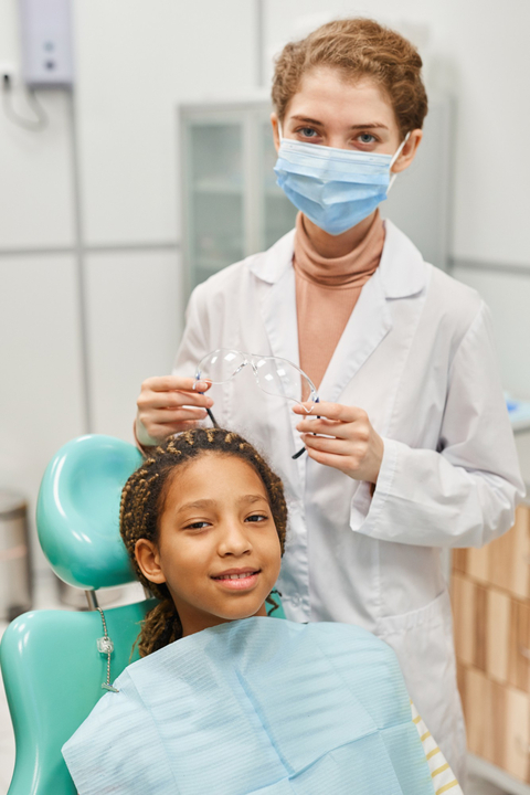 Happy child with dentist