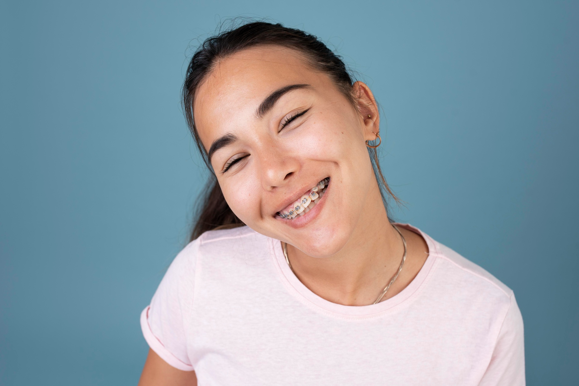 smiling woman with braces